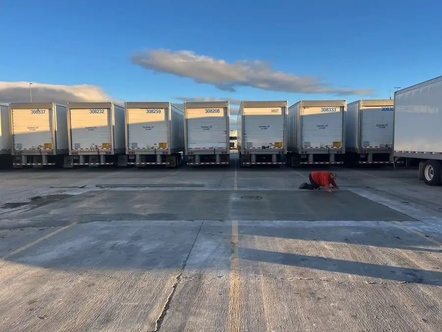 Completed concrete apron in front of the trailer docks at a Walmart distribution center